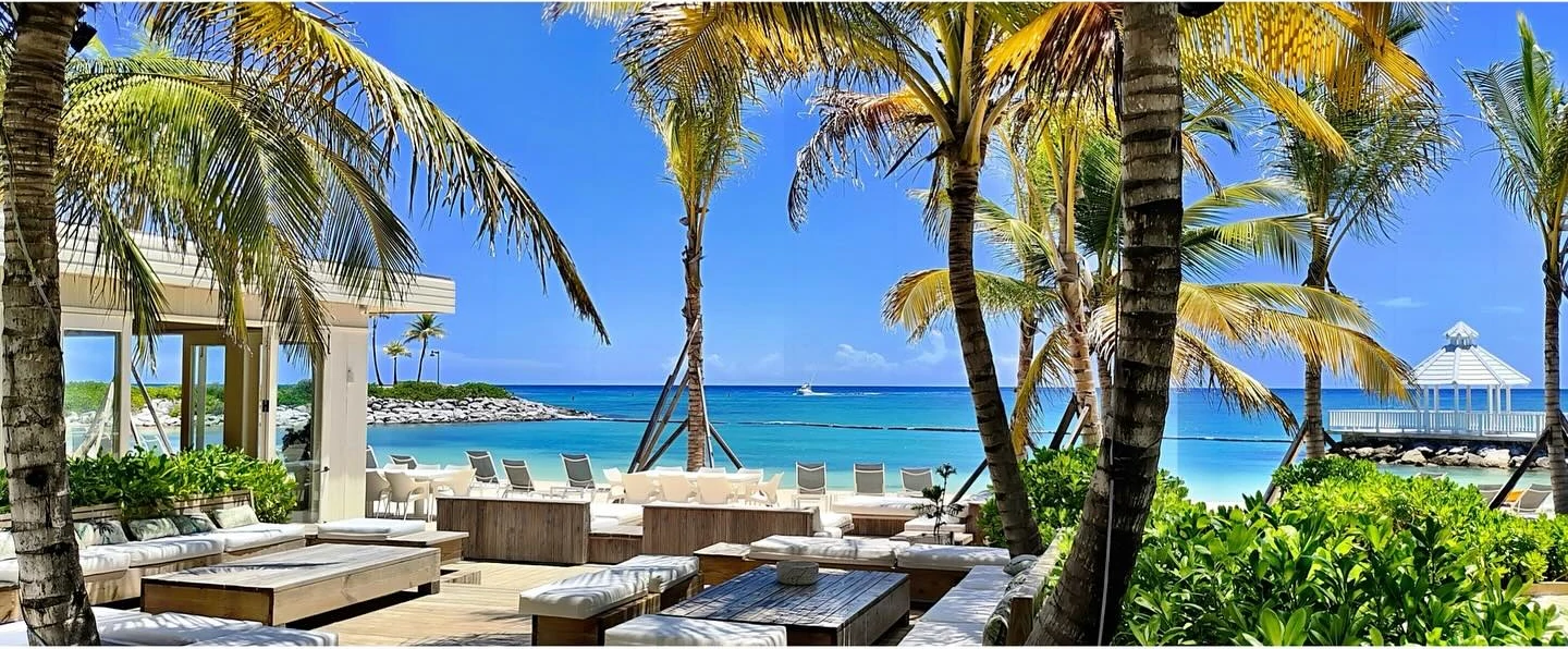 Sunset lounge in Cap Cana with cocktails and marina view