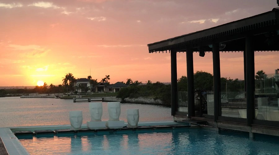 Sunset lounge in Cap Cana with cocktails and marina view